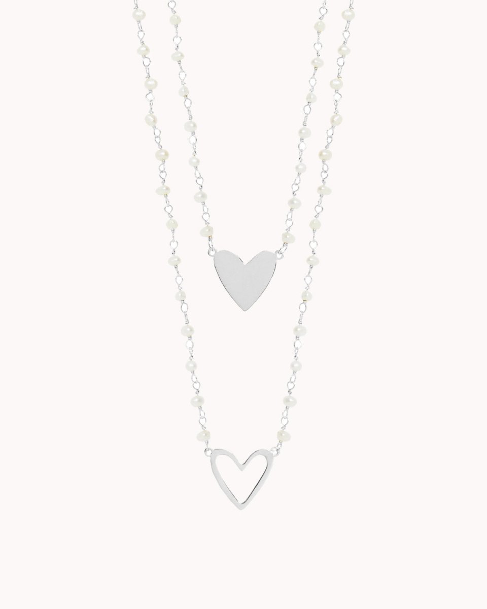 Escapulário enfiado a terço com um coração fixo de cada lado - Colares Our Sins