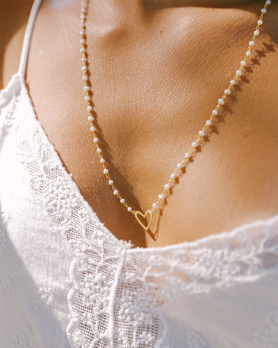 Escapulário enfiado a terço com um coração fixo de cada lado - Colares Our Sins